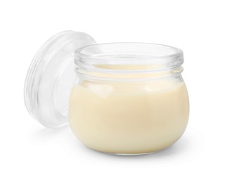 Photo of Open jar with condensed milk isolated on white