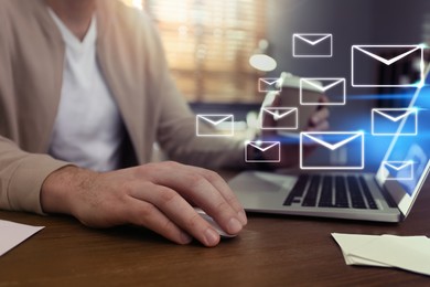 Image of Businessman sending emails at table indoors, closeup