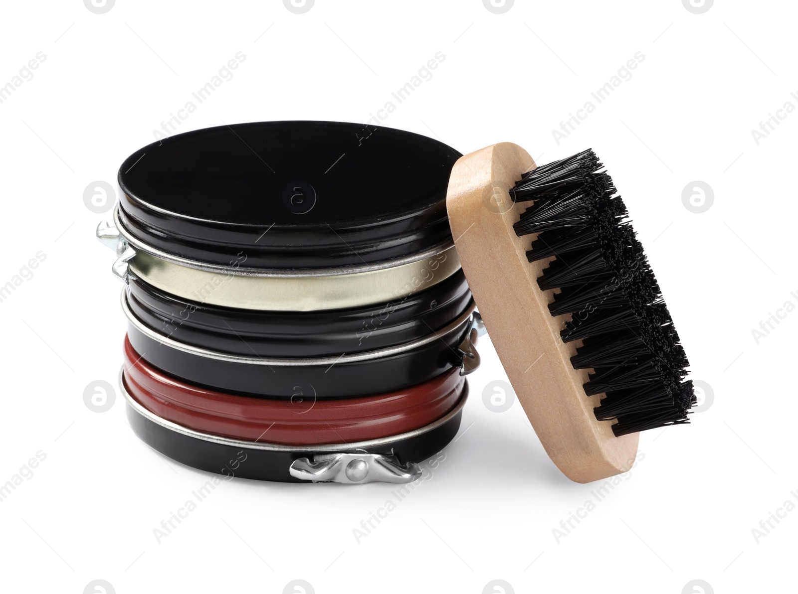 Photo of Shoe care accessories on white background. Footwear shine items