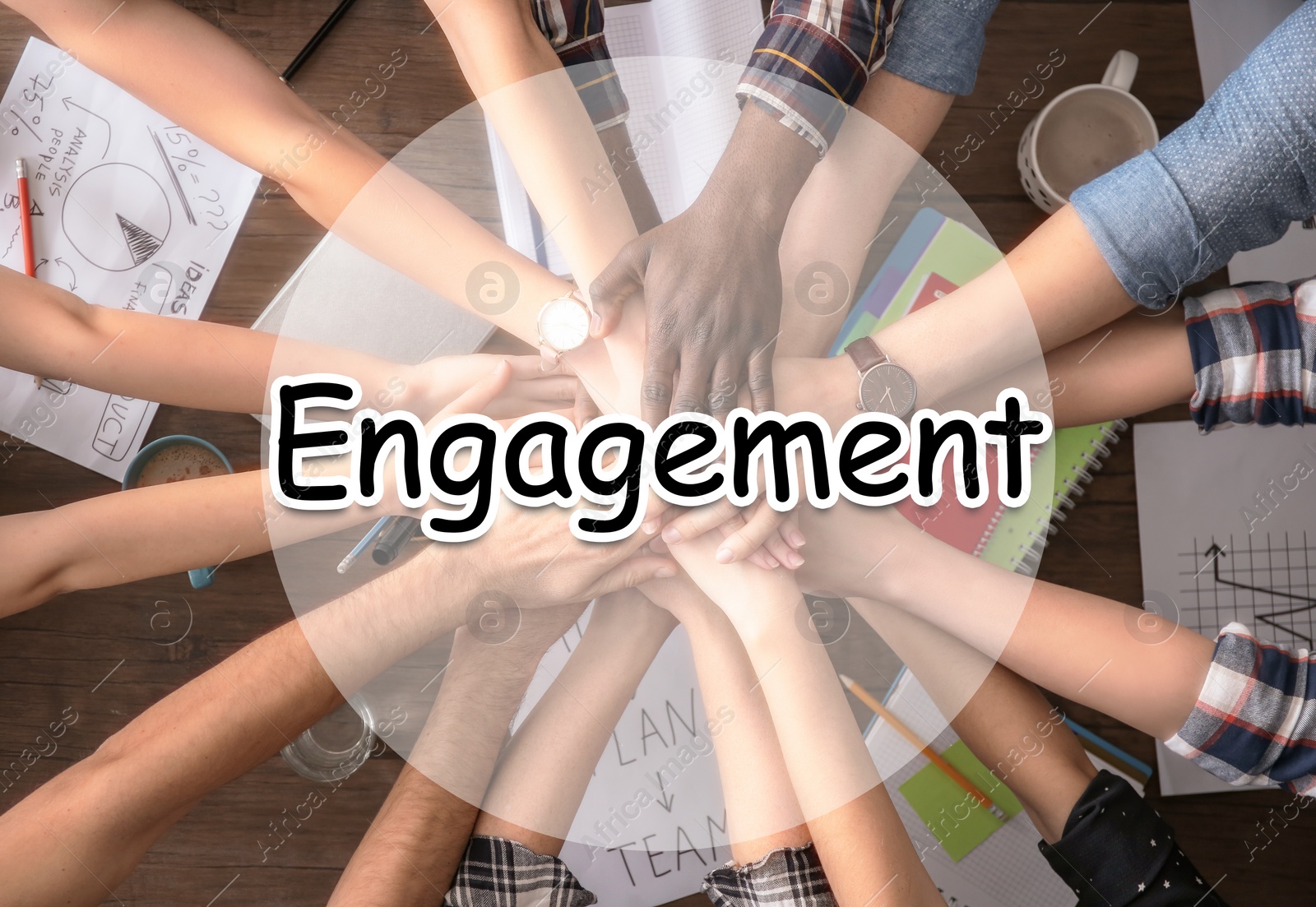 Image of Engagement concept. People holding hands together over table, top view 