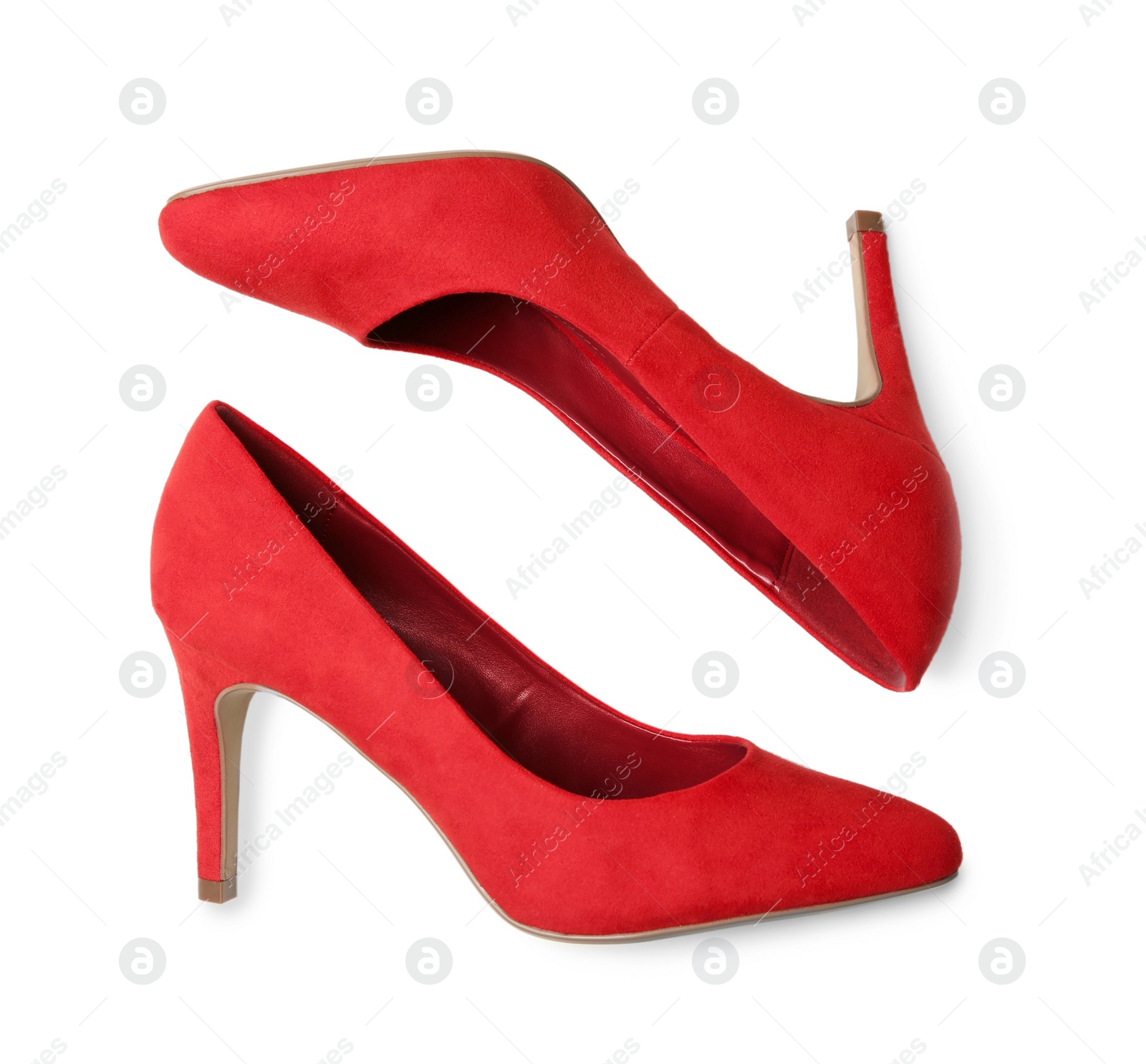 Photo of Pair of red female shoes on white background