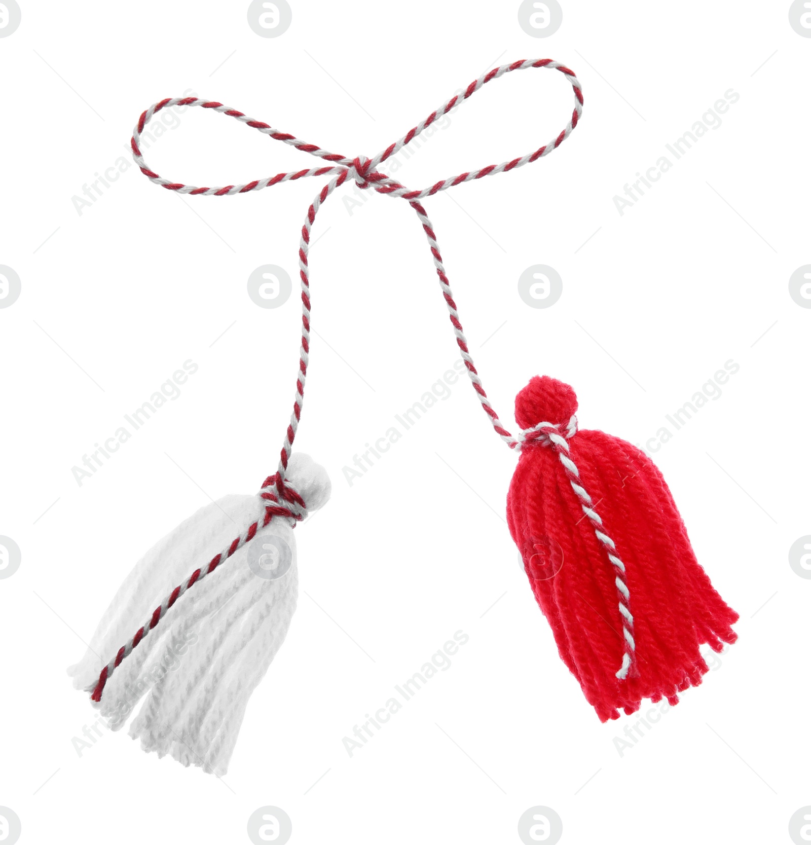 Photo of Traditional martisor on white background. Beginning of spring celebration