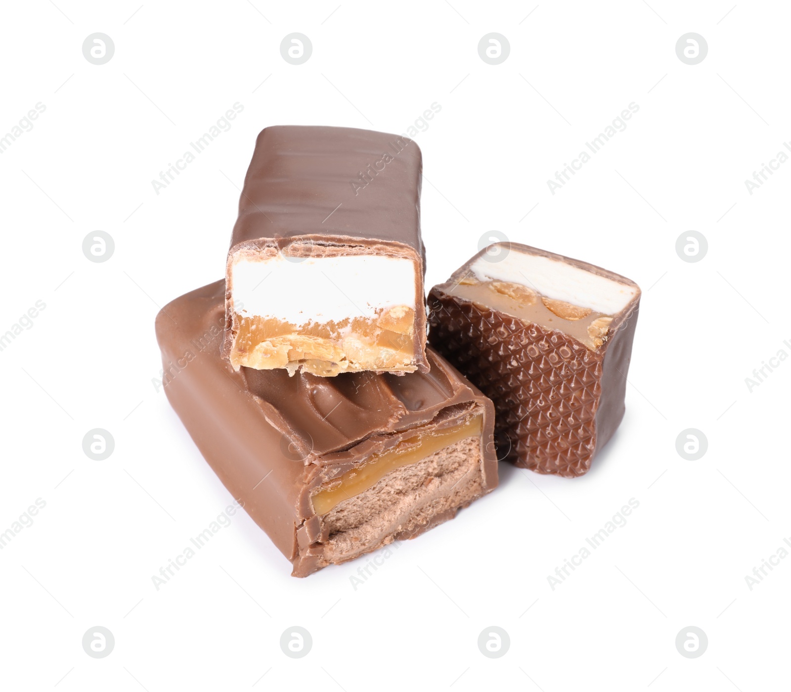 Photo of Pieces of tasty chocolate bars with nougat and nuts on white background