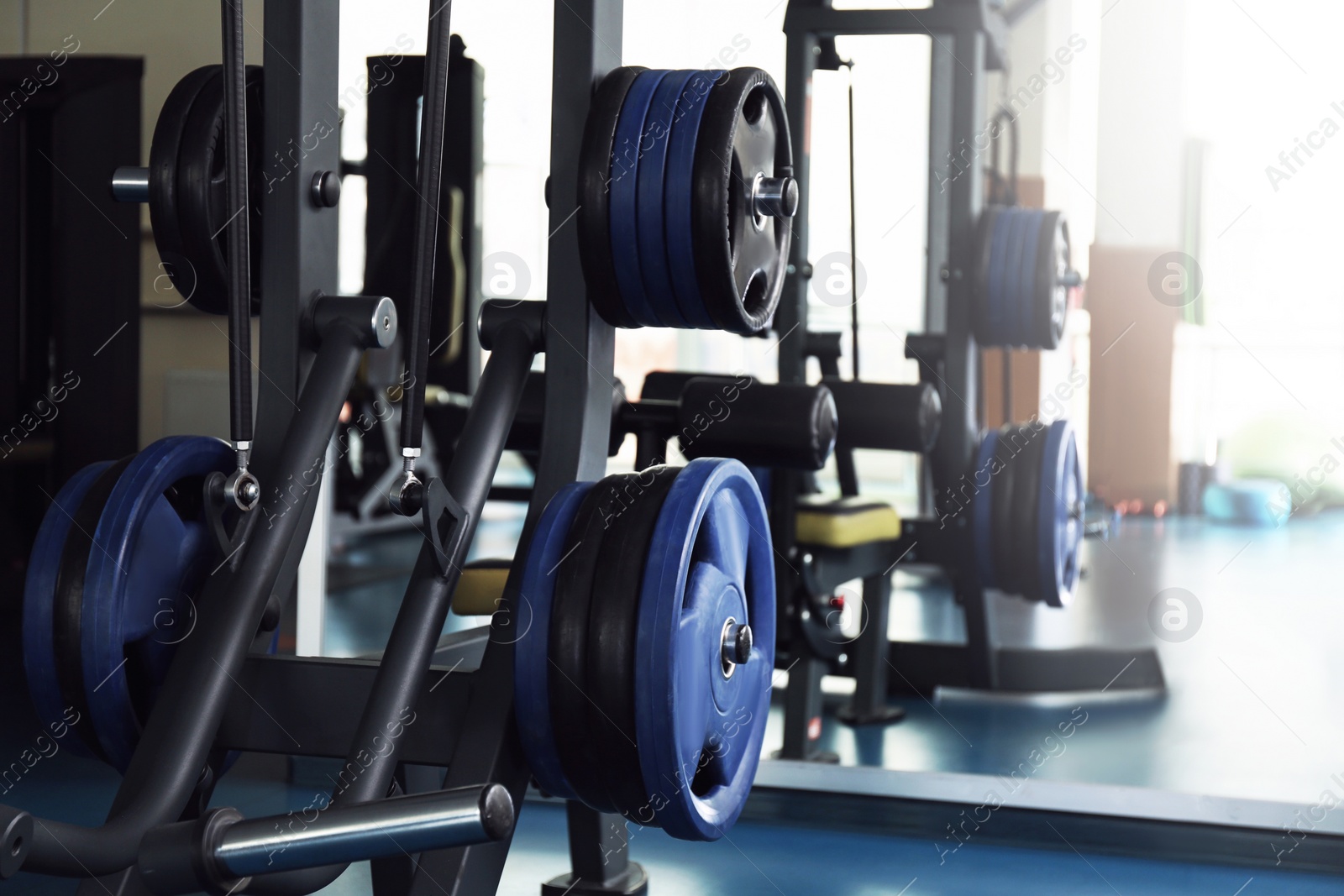 Photo of Interior of modern gym with new equipment