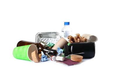 Pile of different garbage on white background. Trash recycling