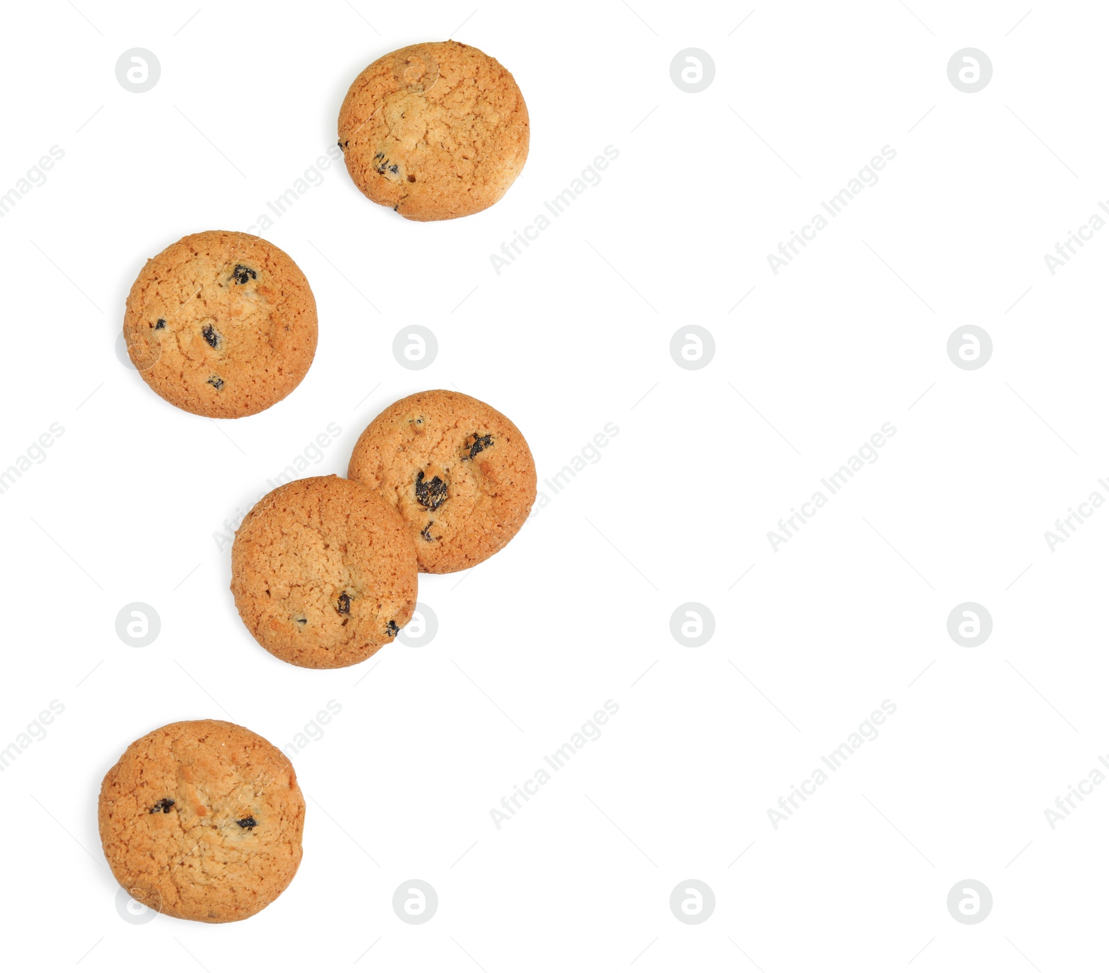 Photo of Tasty homemade cookies with raisins on white background, top view