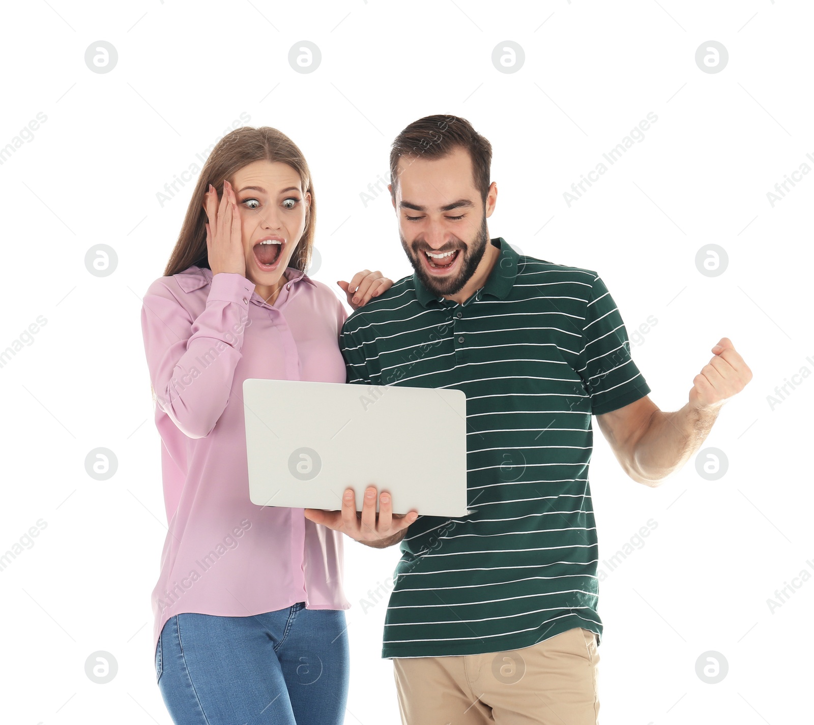 Photo of Emotional young people with laptop celebrating victory on white background