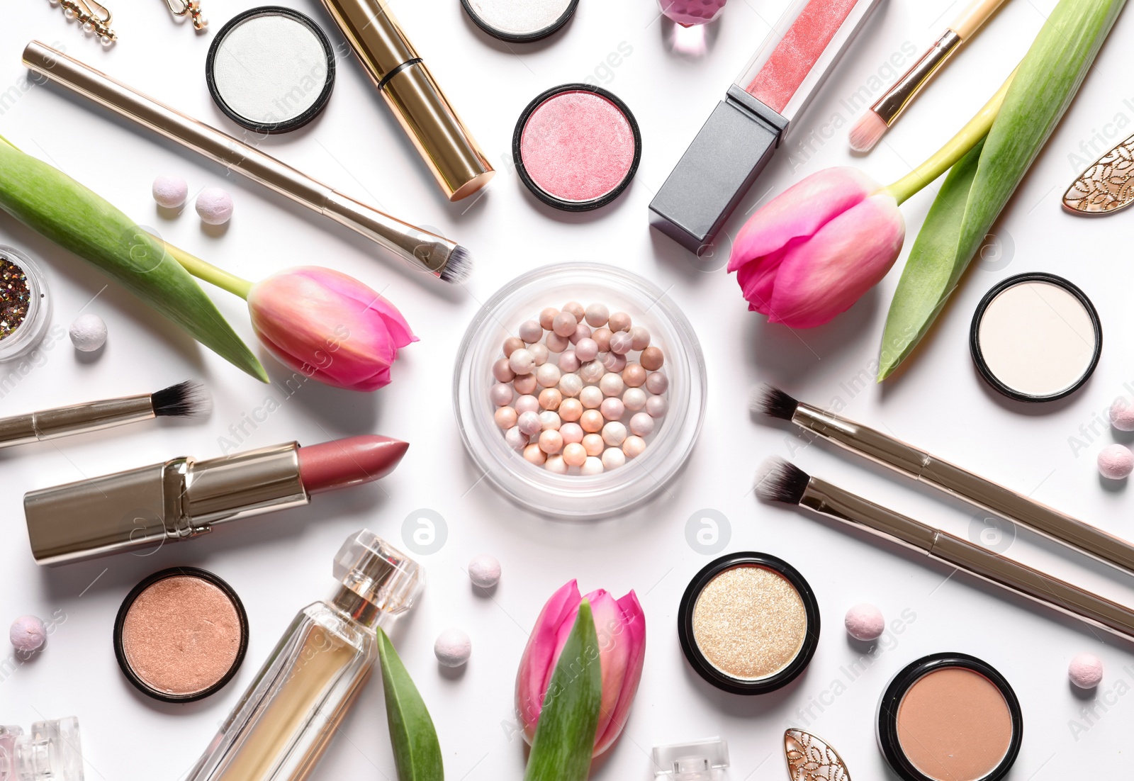 Photo of Different makeup products and flowers on white background, top view