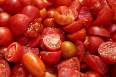 Photo of Cut red ripe tomatoes as background, closeup