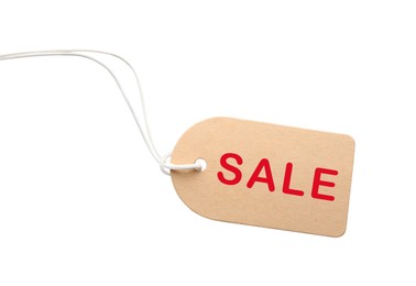 Tag with word SALE on white background