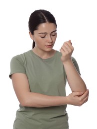Photo of Woman suffering from pain in elbow on white background. Arthritis symptom