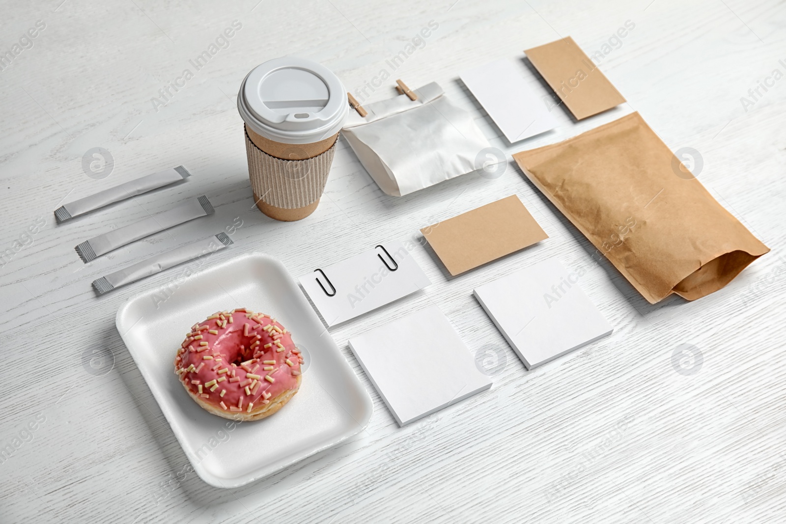 Photo of Composition with items for mock up design on wooden background. Food delivery service