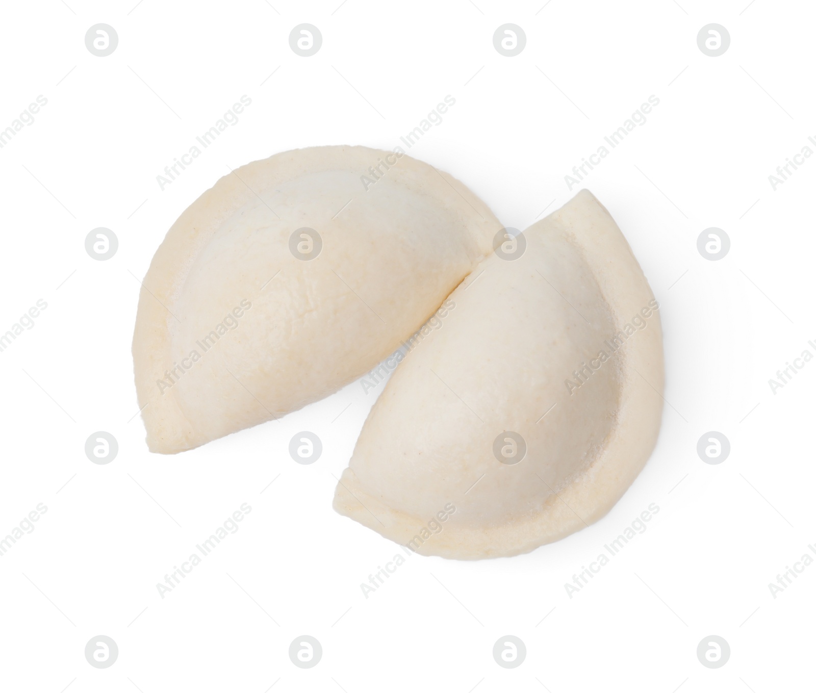 Photo of Raw dumplings (varenyky) with cottage cheese isolated on white, top view