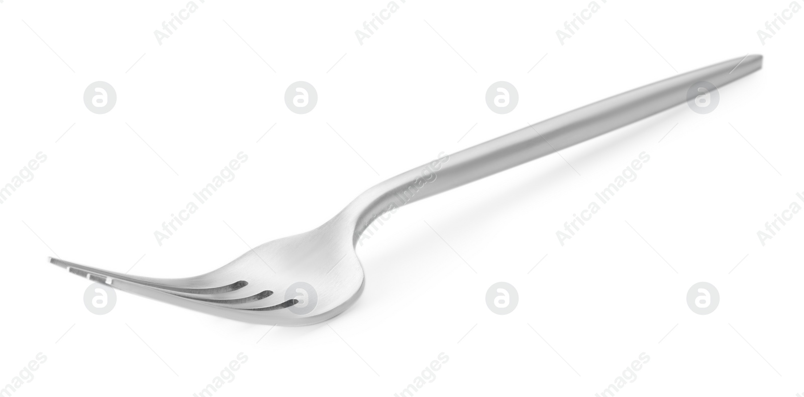 Photo of One shiny silver fork isolated on white