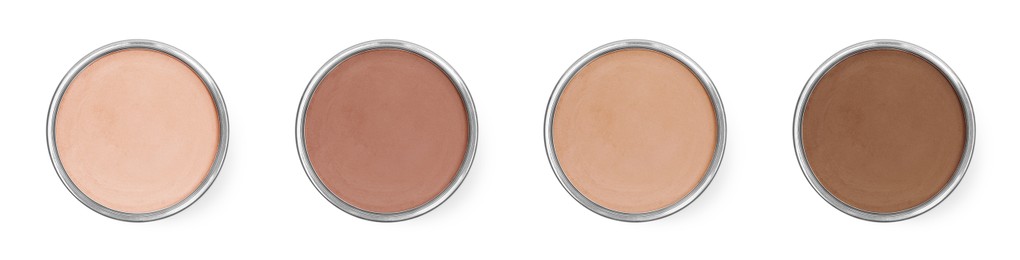 Image of Compact face powders of different shades isolated on white, collection. Top view