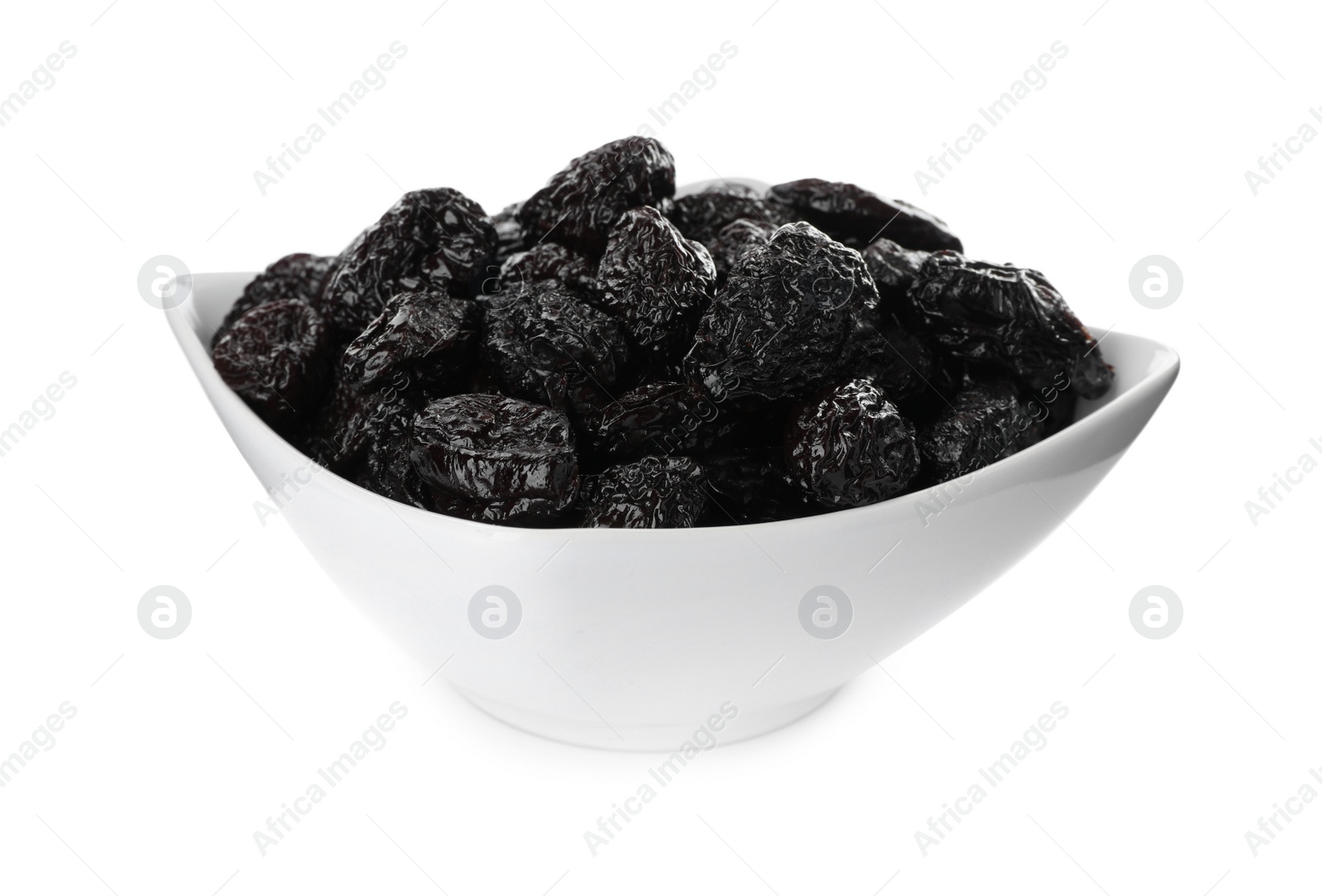 Photo of Bowl with sweet dried prunes isolated on white