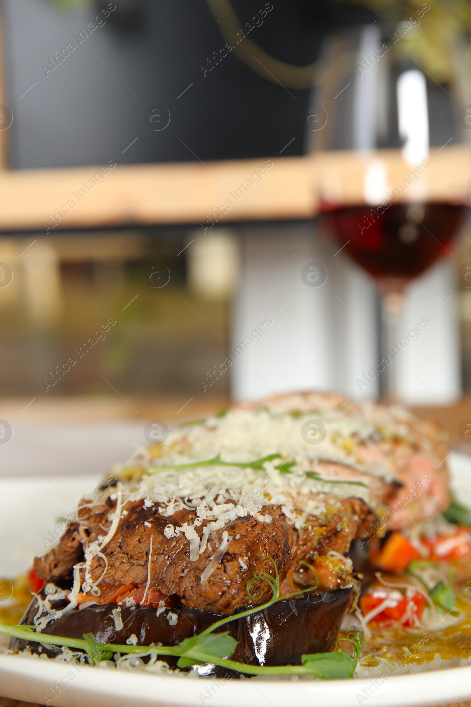 Photo of Delicious roasted meat served on plate, closeup. Space for text