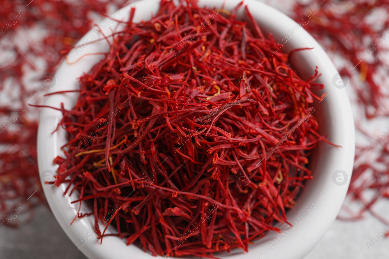 Photo of Aromatic dried saffron on table, top view