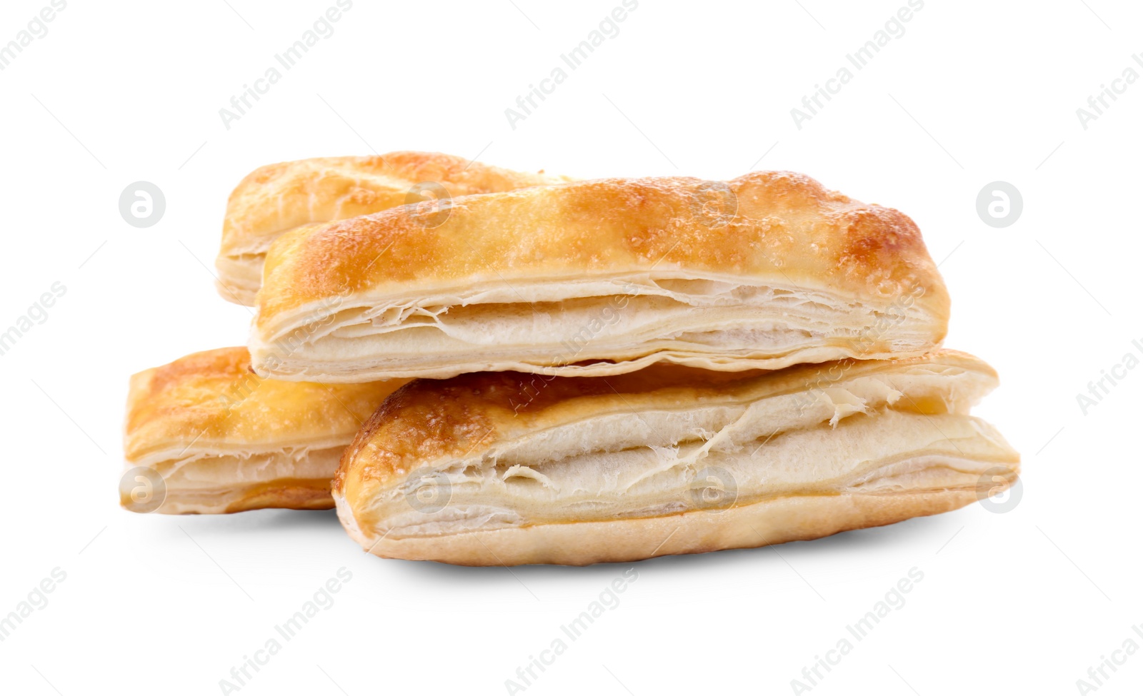 Photo of Delicious fresh puff pastries isolated on white