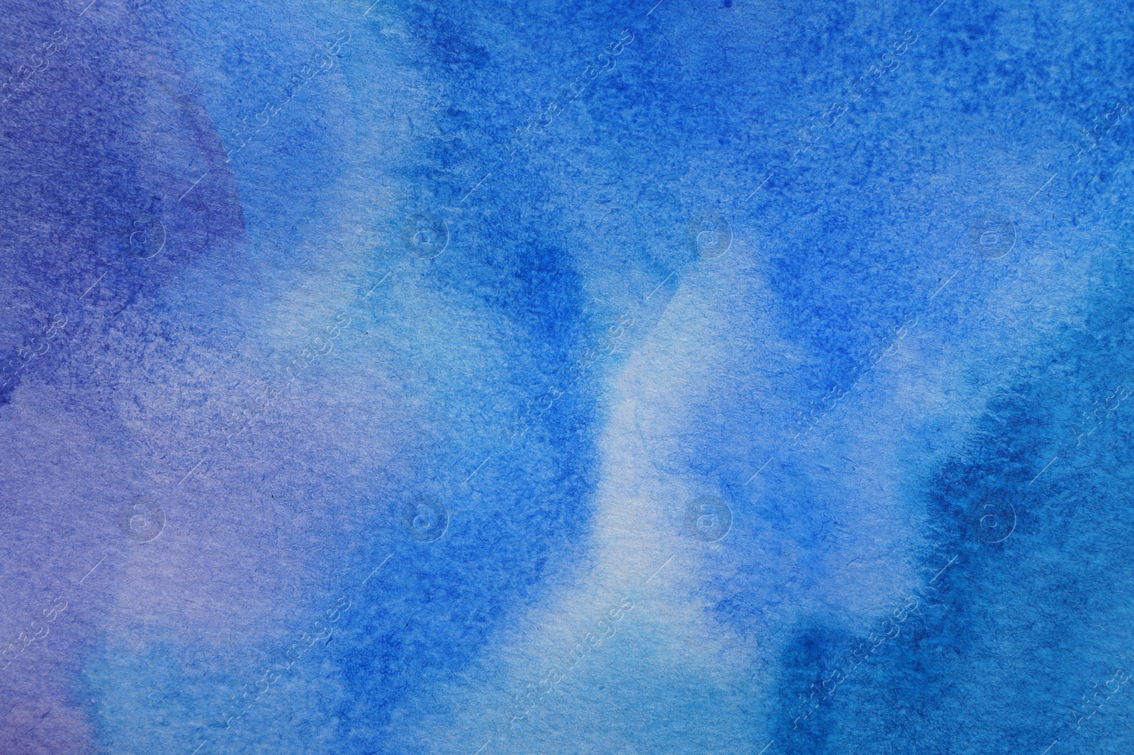 Photo of Abstract blue watercolor painting as background, top view