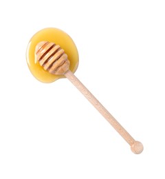Wooden dipper and fresh honey on white background, top view