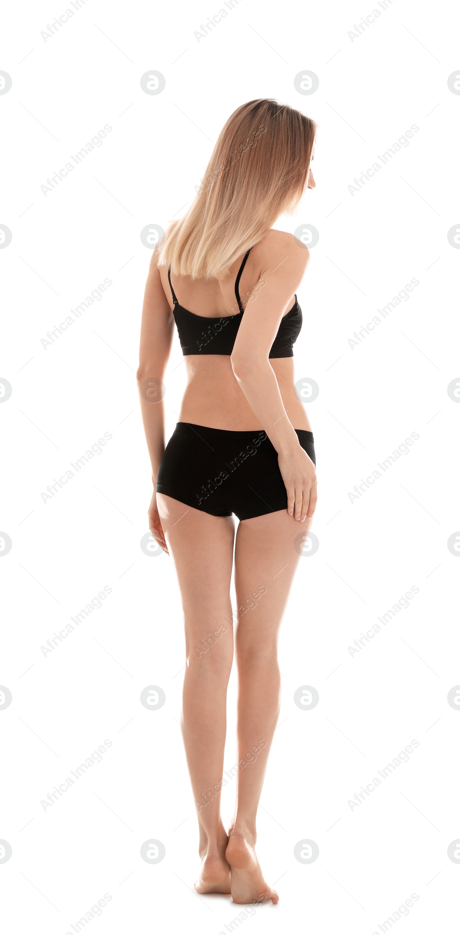 Photo of Young slim woman on white background. Perfect body