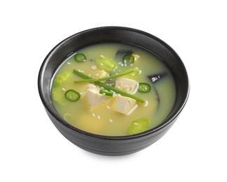 Photo of Bowl of delicious miso soup with tofu isolated on white