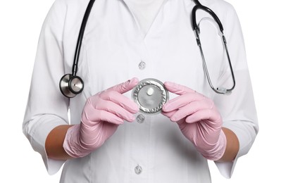 Photo of Doctor holding blister of emergency contraception pill on white background, closeup