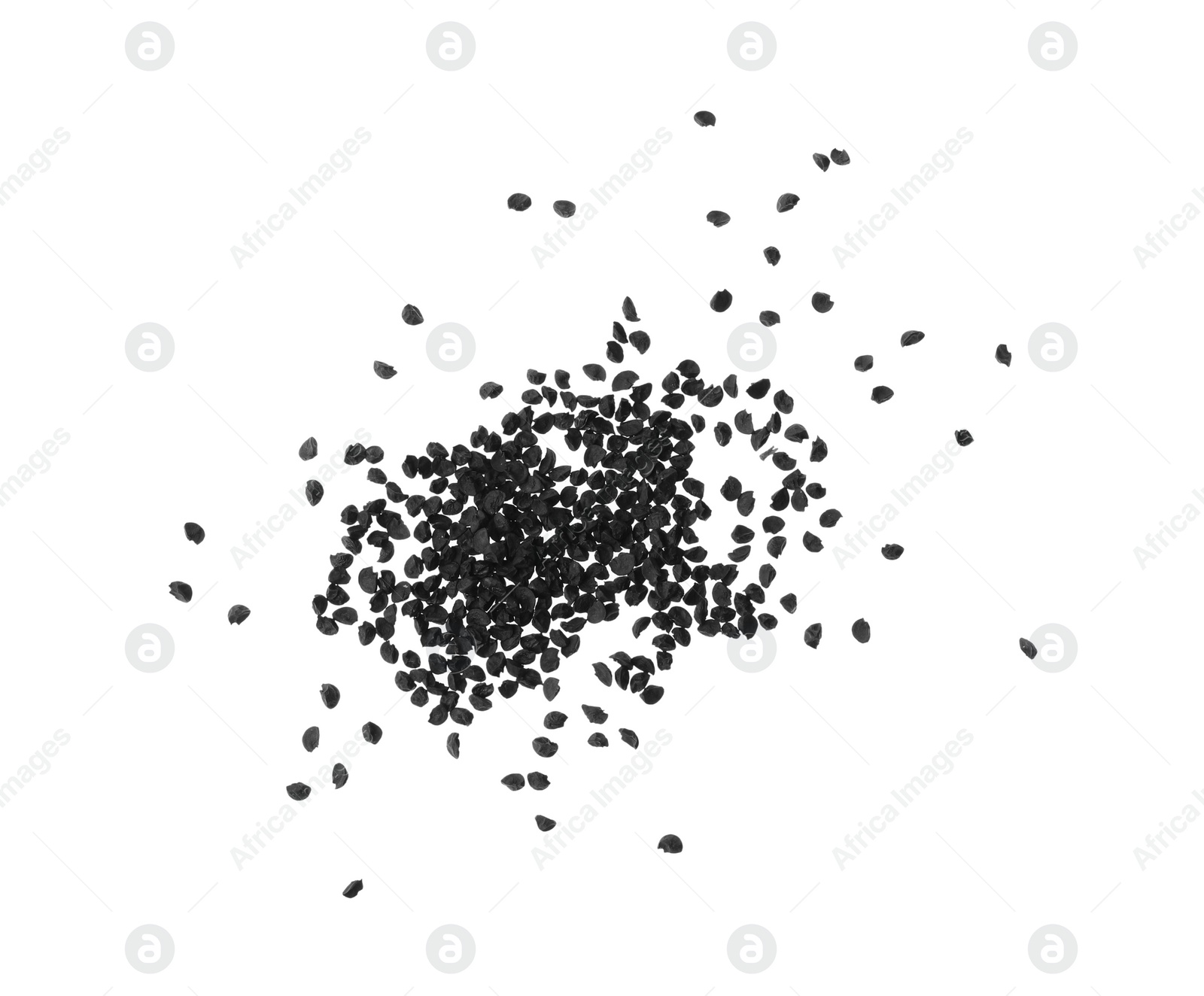 Photo of Pile of raw onion seeds on white background, top view. Vegetable planting