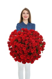 Beautiful young woman with bouquet of roses on white background