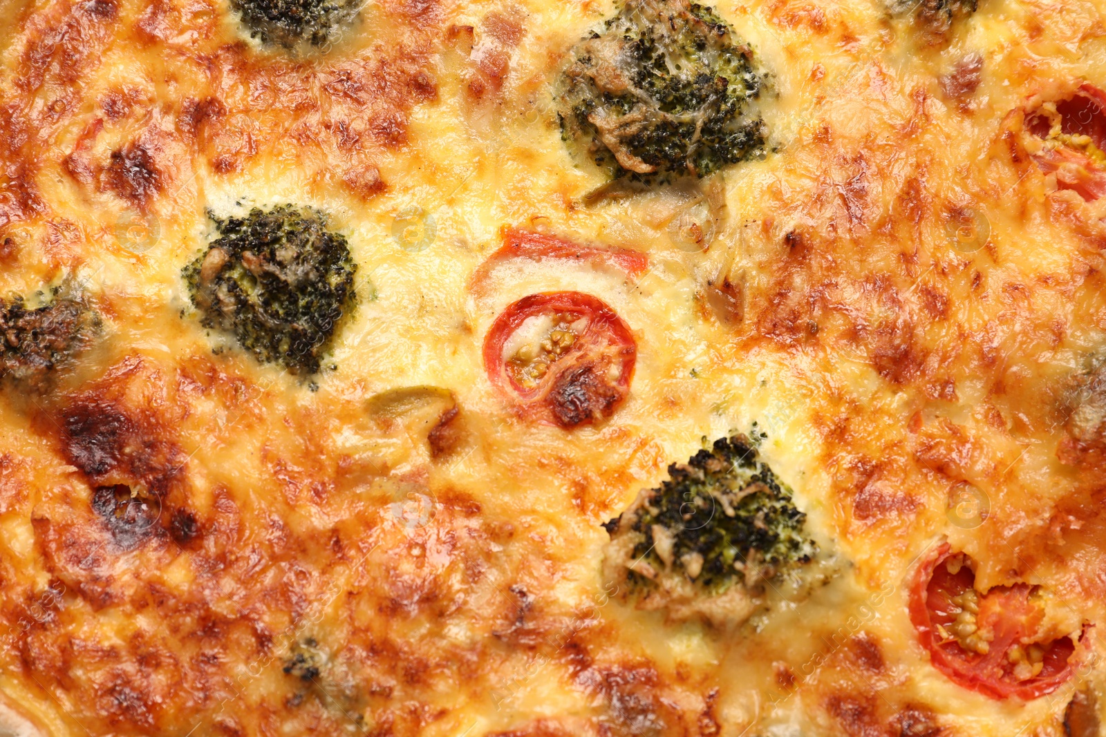 Photo of Delicious homemade vegetable quiche as background, closeup