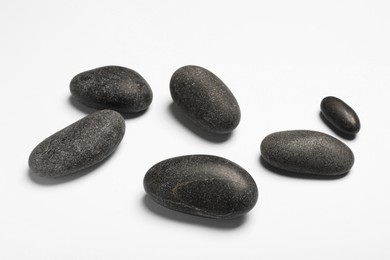 Photo of Group of different stones on white background