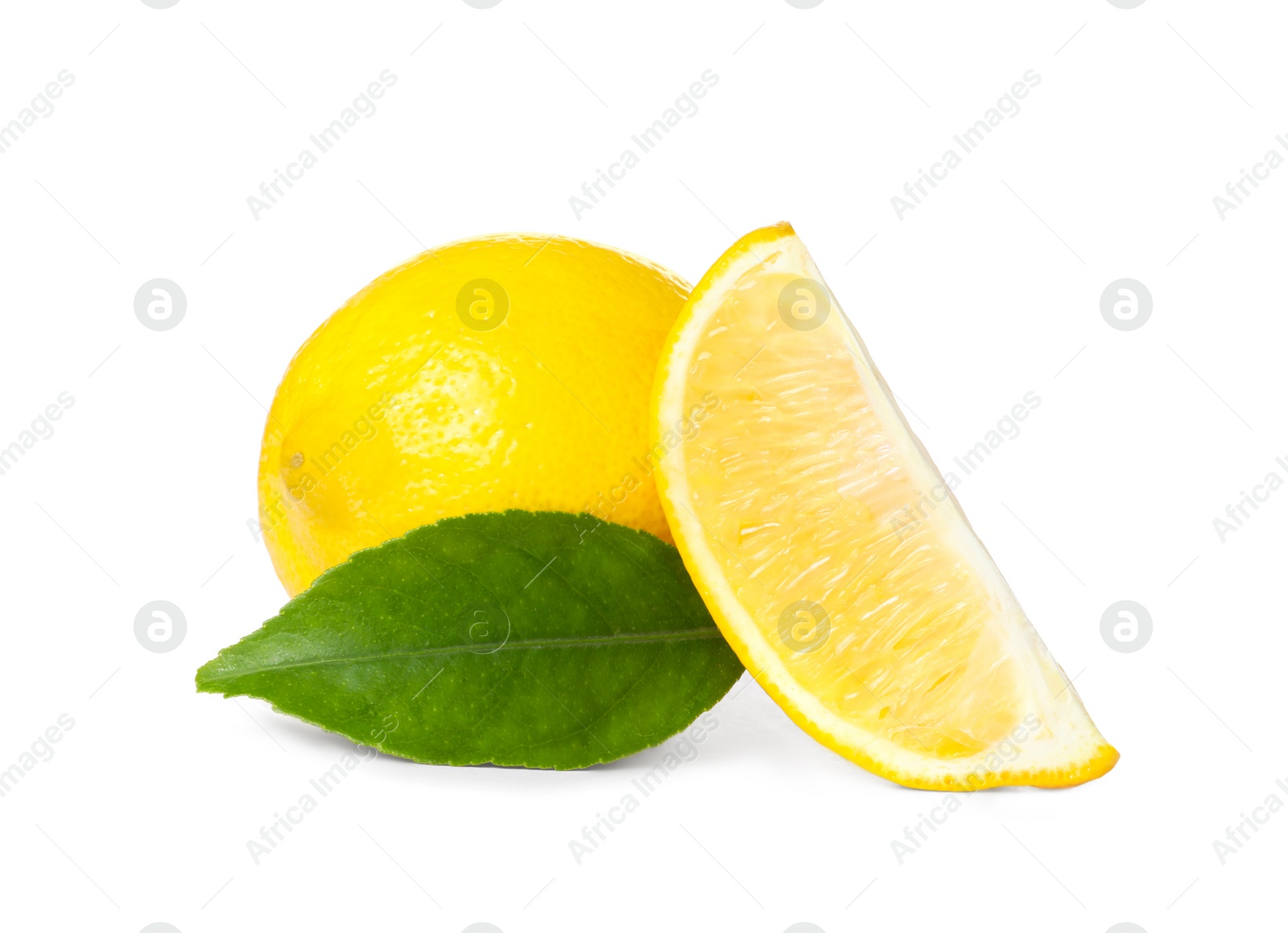 Photo of Fresh ripe lemon and juicy piece with leaf on white background