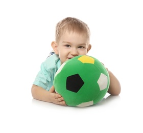 Cute little child with soft soccer ball on white background. Playing indoors