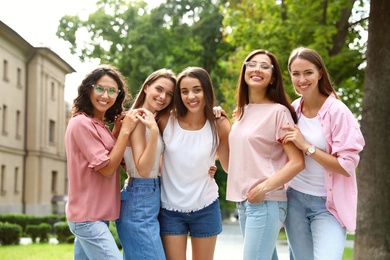 Happy women outdoors on sunny day. Girl power concept