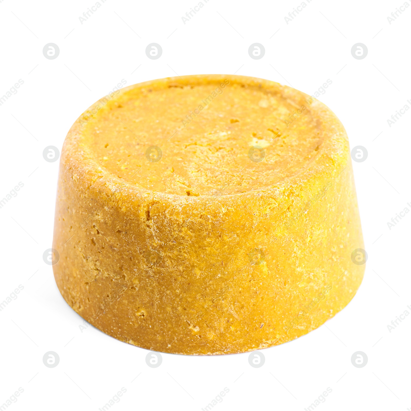 Photo of Yellow solid shampoo isolated on white. Hair care