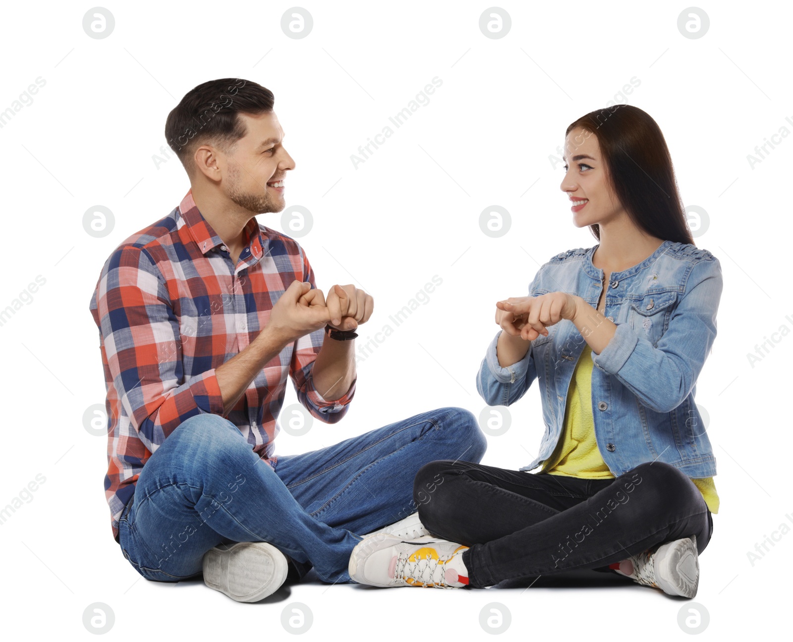 Photo of Hearing impaired friends using sign language for communication isolated on white