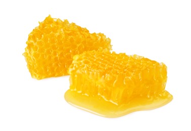 Pieces of natural honeycomb with tasty honey isolated on white