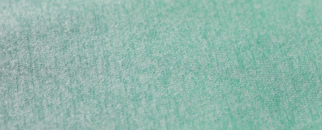 Texture of turquoise fabric as background, closeup