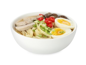 Photo of Delicious ramen with meat and eggs in bowl isolated on white. Noodle soup