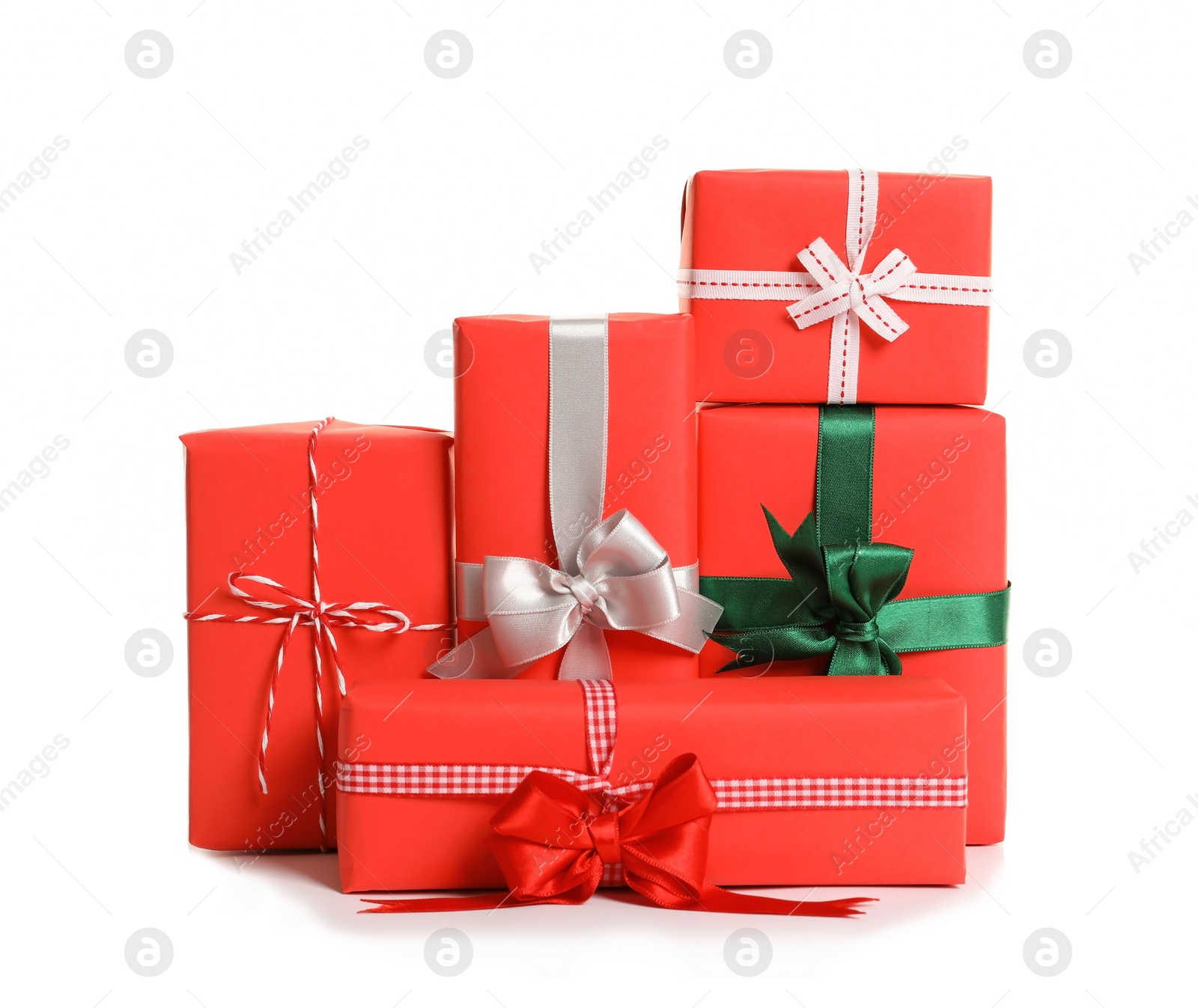 Photo of Beautifully wrapped gift boxes on white background