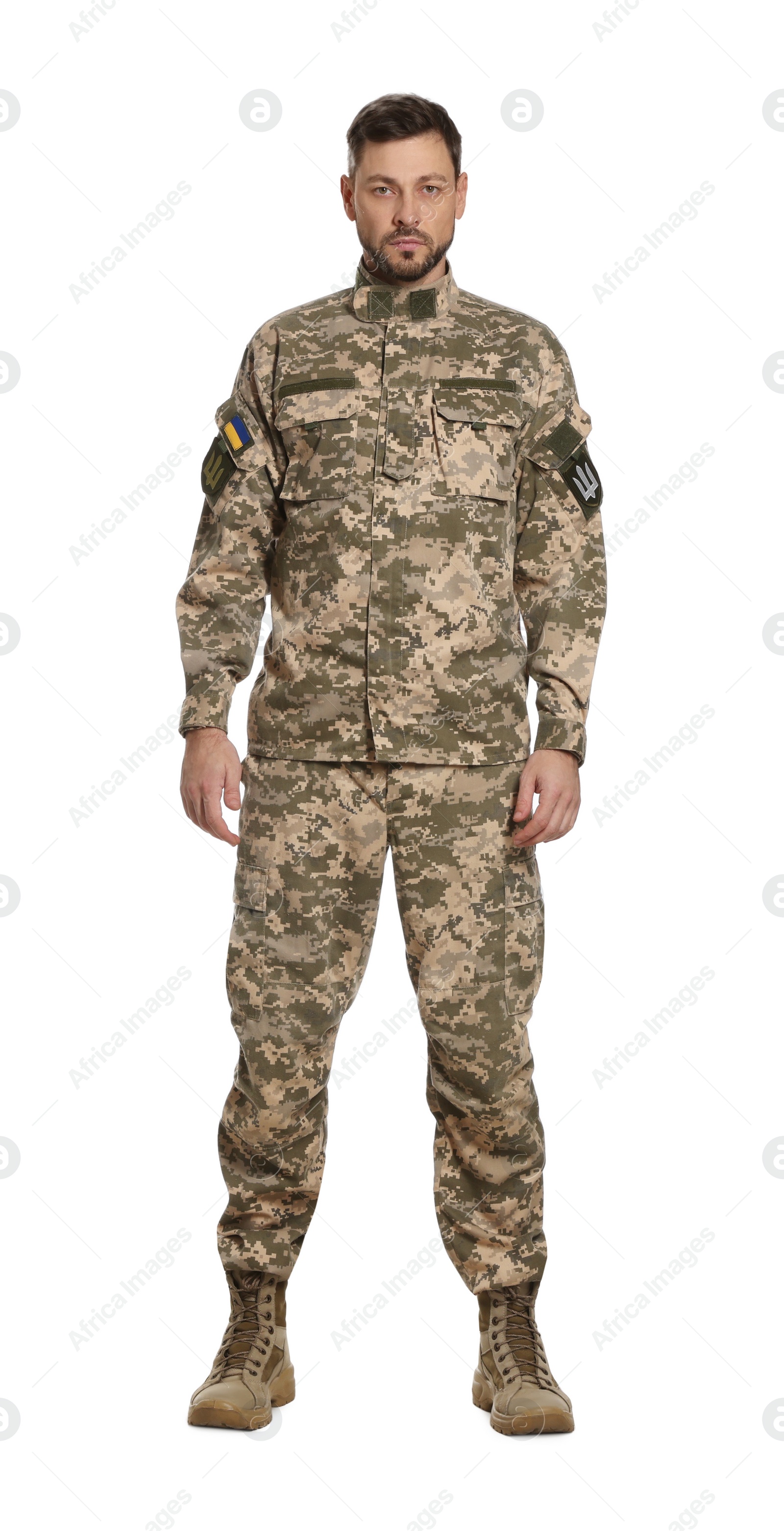 Photo of Ukrainian soldier in military uniform on white background