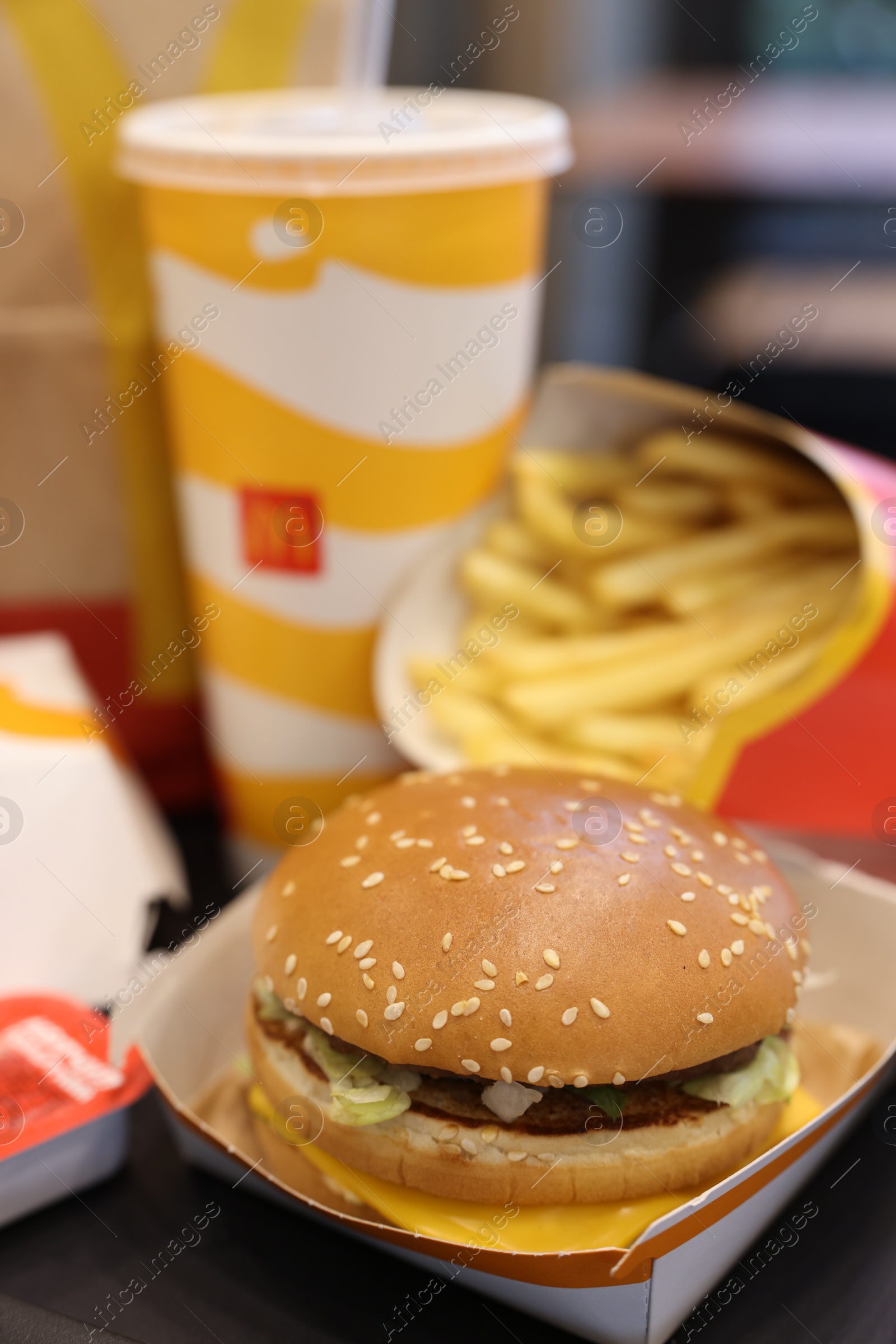 Photo of Lviv, Ukraine - October 9, 2023: McDonald's menu on table in restaurant, closeup