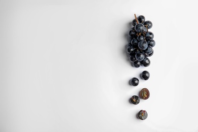 Photo of Fresh ripe juicy grapes on white background, top view