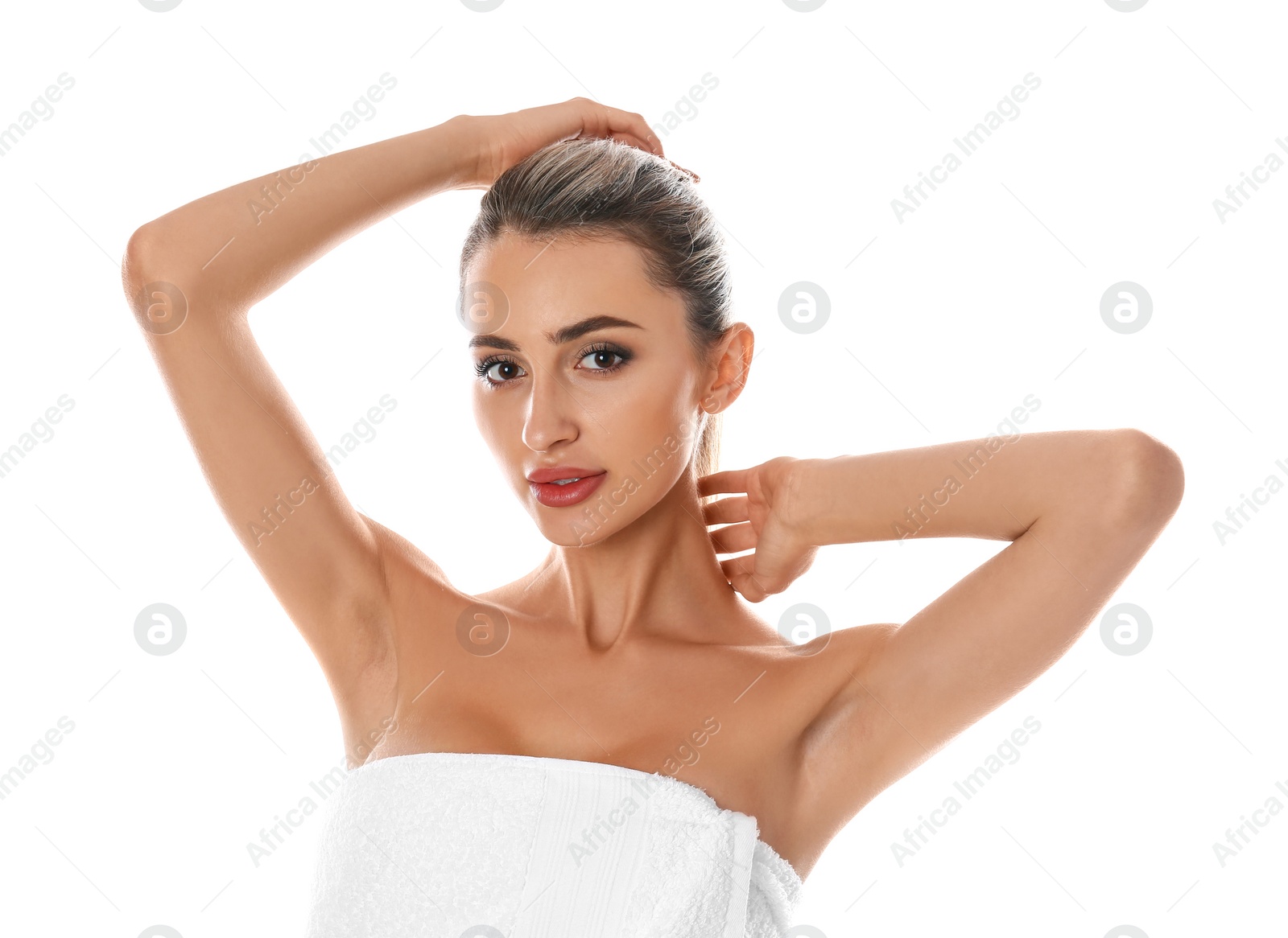 Photo of Young woman showing armpit on white background. Epilation procedure