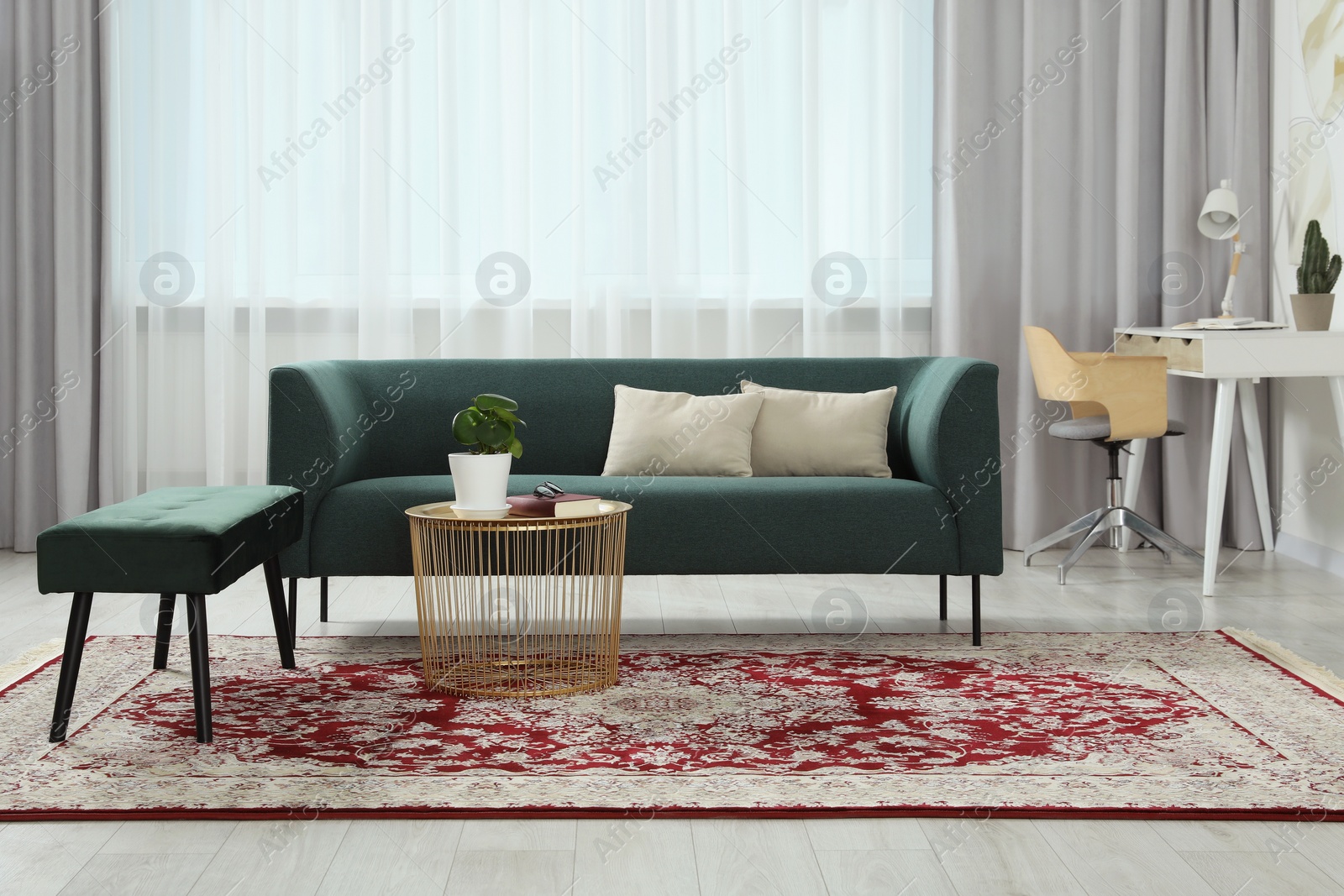 Photo of Stylish living room with beautiful carpet and furniture. Interior design