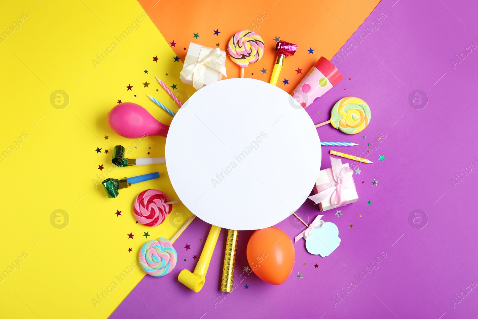 Photo of Different birthday party items and blank card on color background, flat lay. Space for text