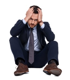 Upset bearded businessman in suit on white background