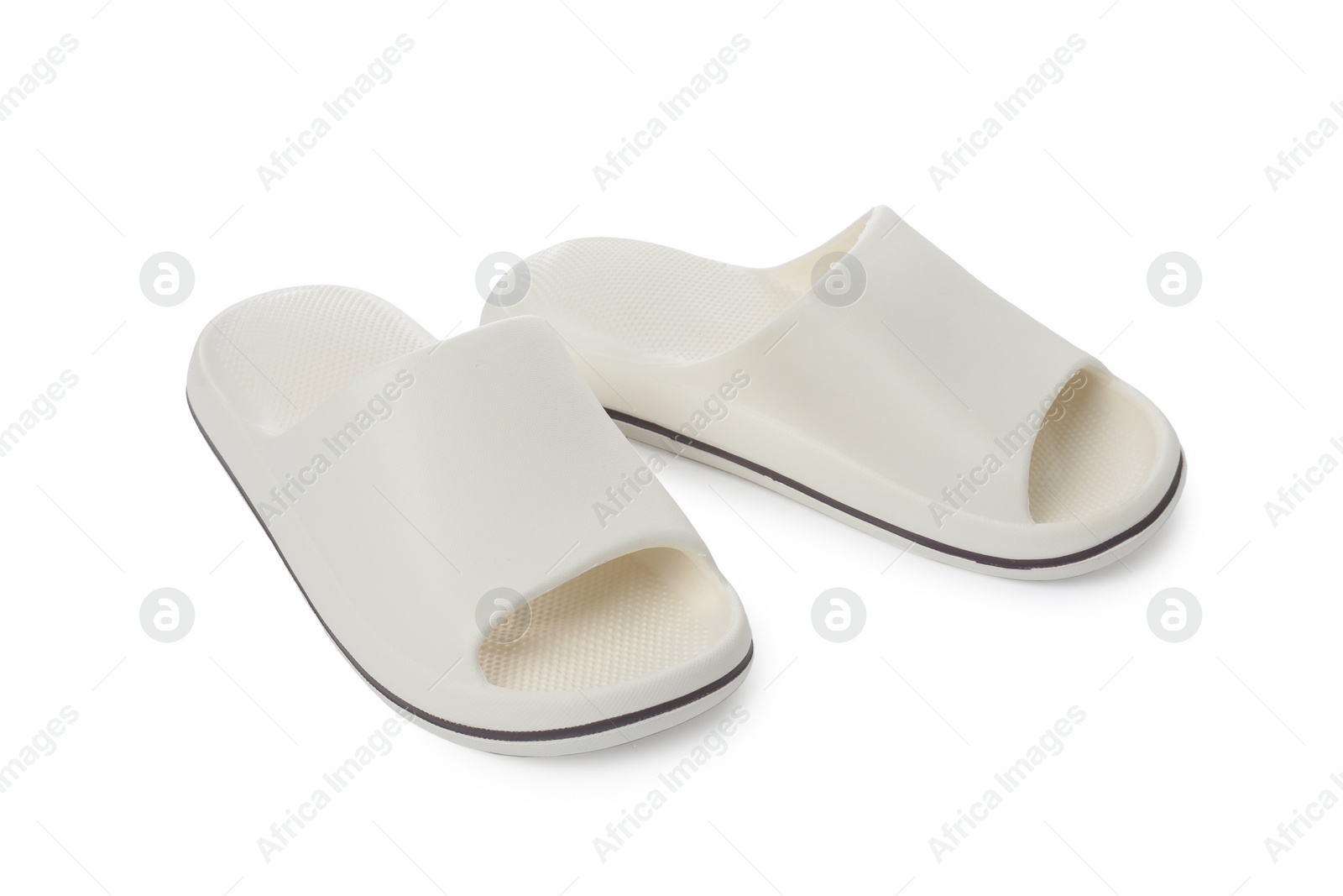 Photo of Pair of rubber slippers isolated on white