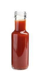 Photo of Tasty ketchup in glass bottle isolated on white. Tomato sauce